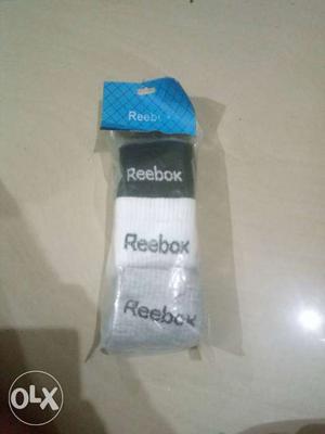 Pair Of Gray Reebok Socks With Pack
