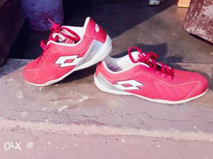 Pair Of Red-and-white Lotto Running Shoes