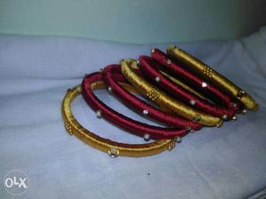 Six Gold-and-red Bangle Bracelets