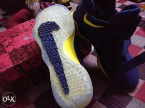 White-and-yellow Nike Basketball Shoes
