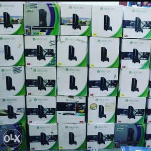 Xbox 360 with kinect 1 year warranty with 200 games