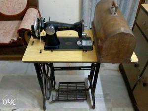 Brown And Black Merritt Treadle Sewing Machine