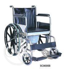Folded wheel chair with bed pan