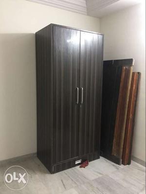 Less than year old cupboard with keys and drawers