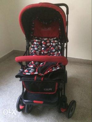 Toddler's Red And Black Stroller