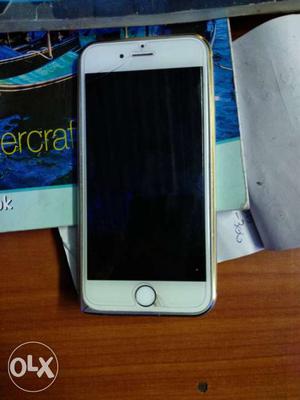 I phone 6 16 gb white gold with black skin and 2