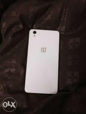 OnePlus X Gold with original Black Apricot case