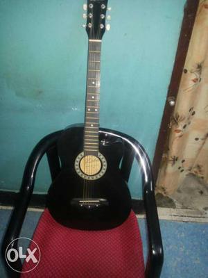 Black Acoustic Guitar