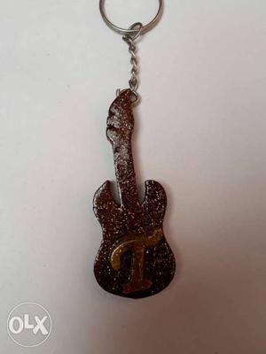 Brown Wooden Letter T Embossed Guitar Keychain