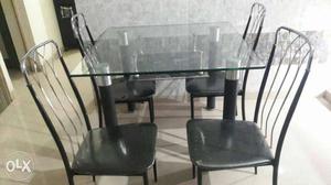 Dinning table with four chairs very good condition