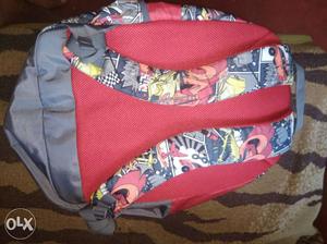 Grey, Yellow, And Red Backpack