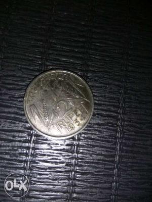 Old indian 1/2 coin at .