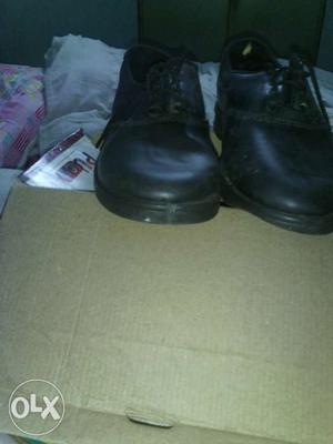 Pair Of Black Leather Work Shoes