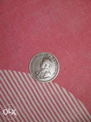 Pre-independence king George 5 emperor coin.