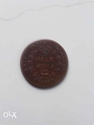 Round Gold-colored Indian Anna Coin