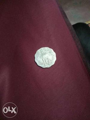 Round Silver 10 Scalloped Edge Coin