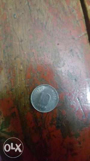 Round Silver-colored 10 Indian Paise Coin Negotiable