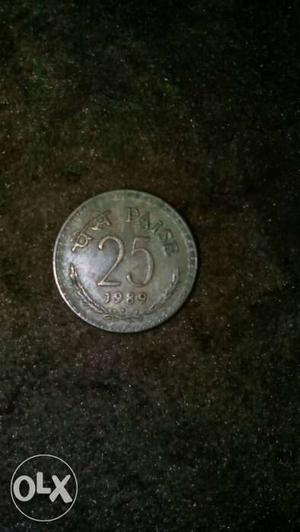 Round  Silver-colored 25 Indian Paise Coin