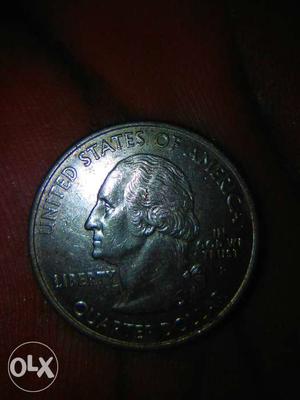 Round Silver-colored U.S. Quarter Dollar Coin