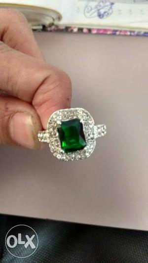 Silver-colored And Emerald Stone Ring