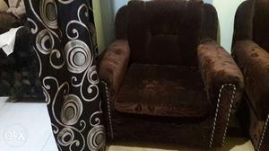 A three seater sofa with two one seater sofa and