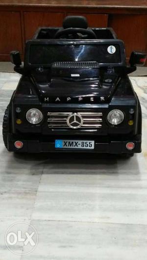 Black Mercedes-Benz Happer Ride On Toy