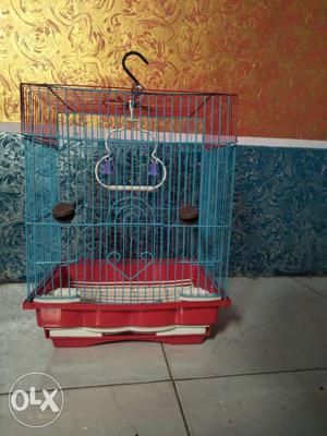 Blue And Red Bird Cage