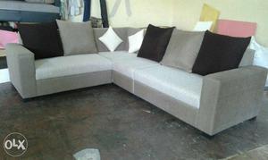 Gray Corner Sofa With Throw Pillows