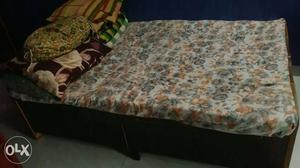 Wood bed in good condition along with 3 mattress
