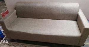 3 seater wooden sofa 1 year old