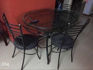 3 yr old dining table with 4 chairs for sale