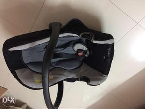 Baby's Gray And Black Convertible Car Seat