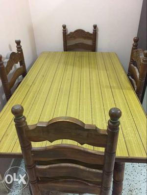 Brown Rectangular Wooden Dining Set