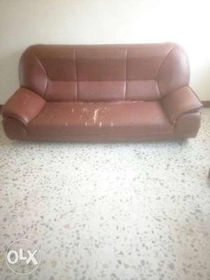 Brown resin 3 seater and single seater sofa set.