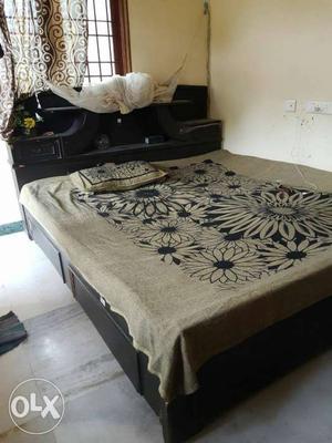 King size wooden bed. Shifting to new place so selling it.
