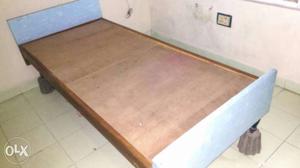 Light blue single bed wood cot