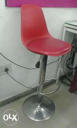 Red And Gray Rolling Chair