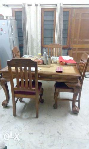 Six seater dining table with four drawers