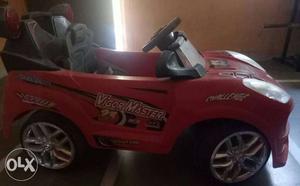 Toddler's Red Vigor Master Plastic Ride-on Toy Car