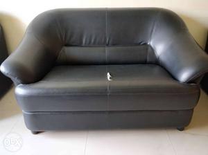 Two seater Leather Sofa. Bottom cover included.