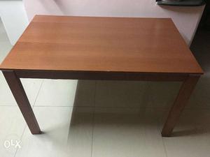Wooden dining table with 4 chairs in good condition
