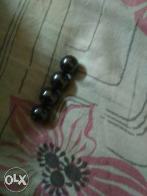 Four Round Silver Beads