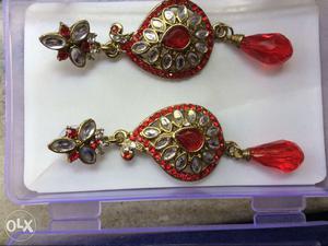 Not used red earings. 3 inch long