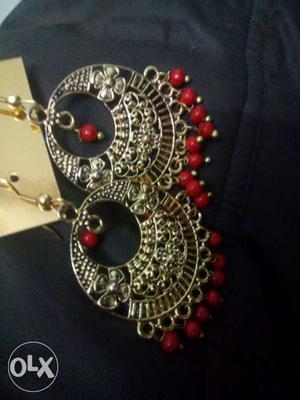 Pair Of Gold-colored Red Beaded Pendant Hook Earrings