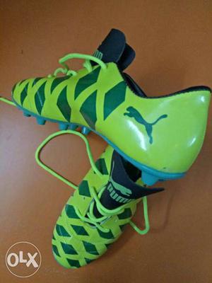 Pair Of Green Puma Cleats