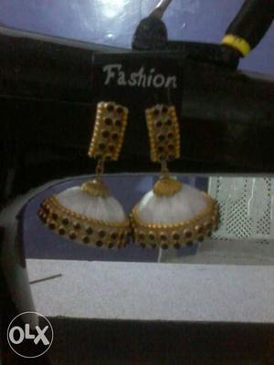 Pair Of White-and-gold-colored Jhumkas Earrings