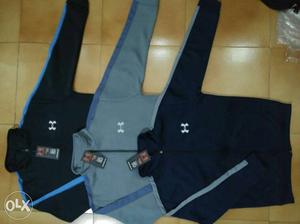 Three Black And Gray Under Armour Zip-up Jackets
