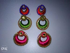 Three Pairs Of Orange, Pink, And Green Silk Earrings