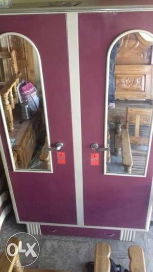 Purple And White Wooden Cabinet With Mirror