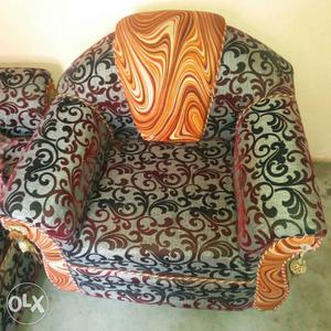 White, Green, And Red Floral Sofa Chair